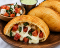 Garden Caprese – Tomato, Mozzarella & Basil Empanada